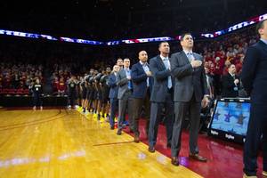 Bobby Perez with a Division I staff before a road game