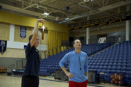 Bobby Perez coaching a player one on one